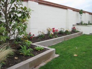 Border edged with Granite with Bright Flowers 